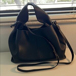 Black Shoulder Bag with Adjustable Strap and Relaxed Shape